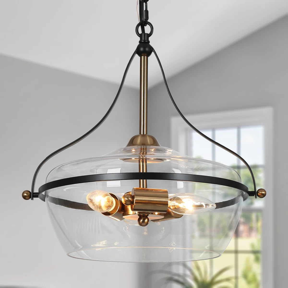 Lampa wisząca Eira Mid-Century Modern z trzema światłami i szklaną misą (1).webp__PID:28afe5c1-62e5-400d-89fc-e43e92c1dccd