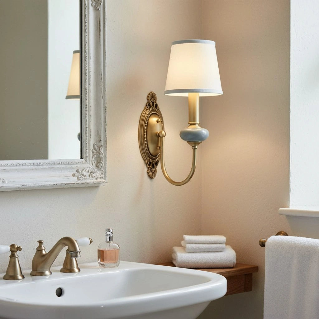 Della wall lamp in bathroom setting