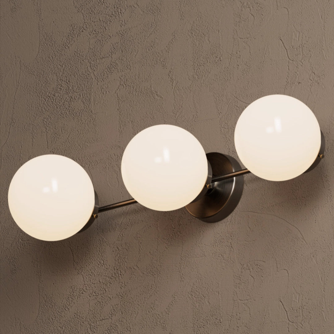 Applique da parete moderno in vetro colorato globo Nina25.webp__PID:d815861e-20b1-4014-8e3e-d7dcf4b3d47a