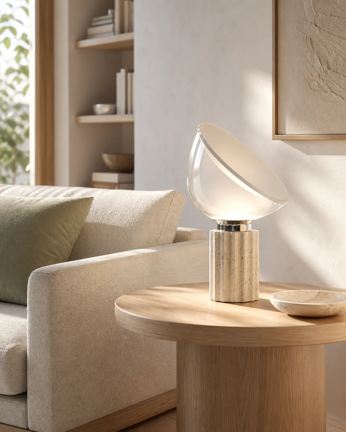 Fluted travertine lamp beside a sofa