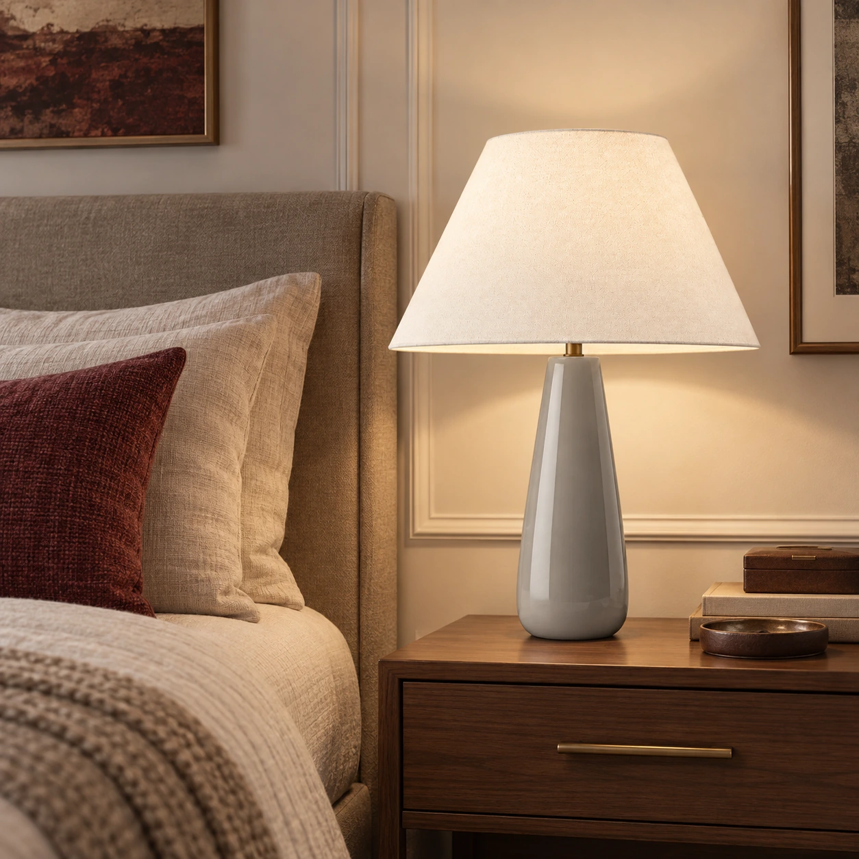 Alden glossy grey ceramic-base lamp in a bedroom